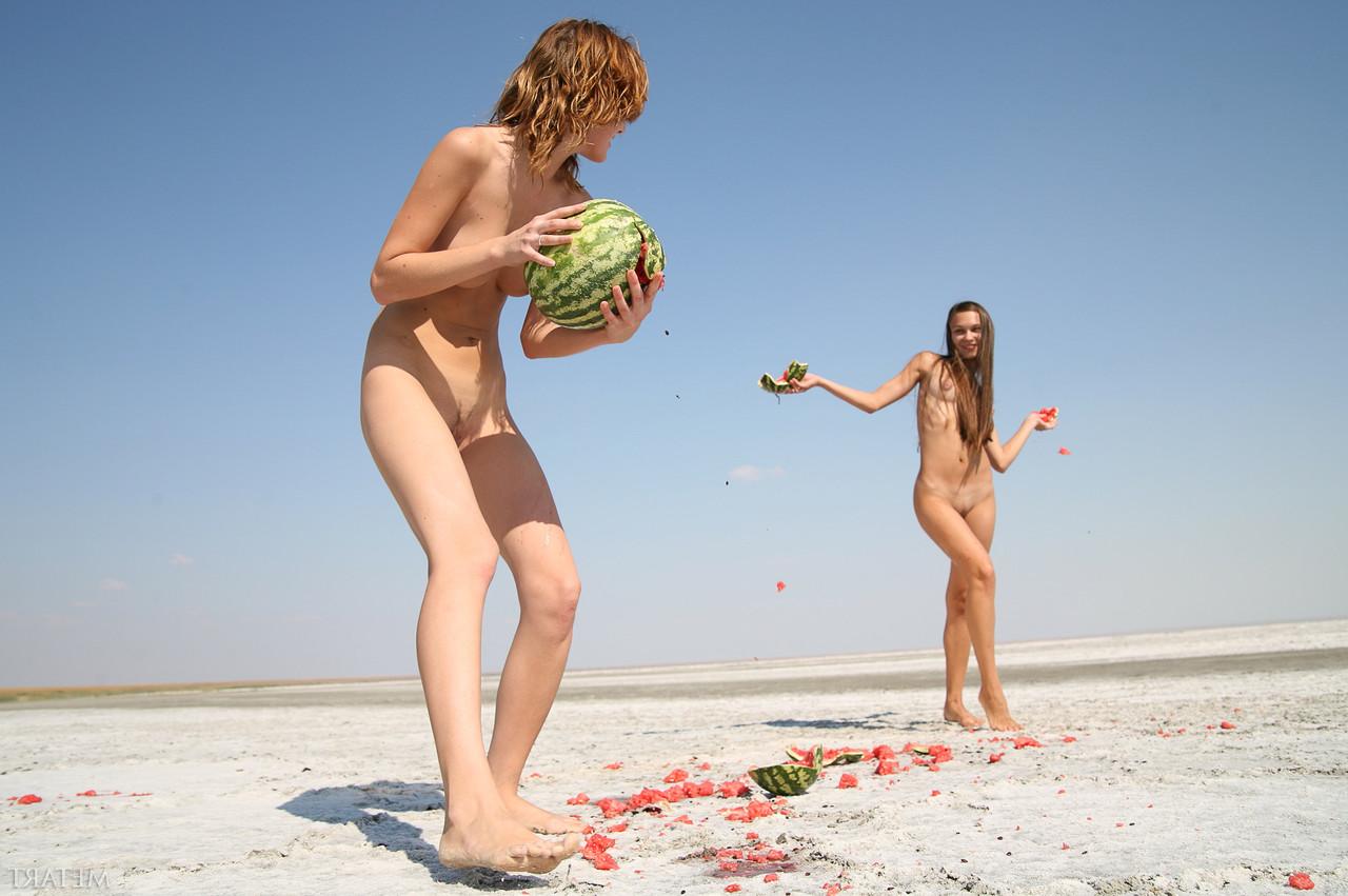 20P Teens Freya A & Itna A play with watermelons while posing naked on the beach