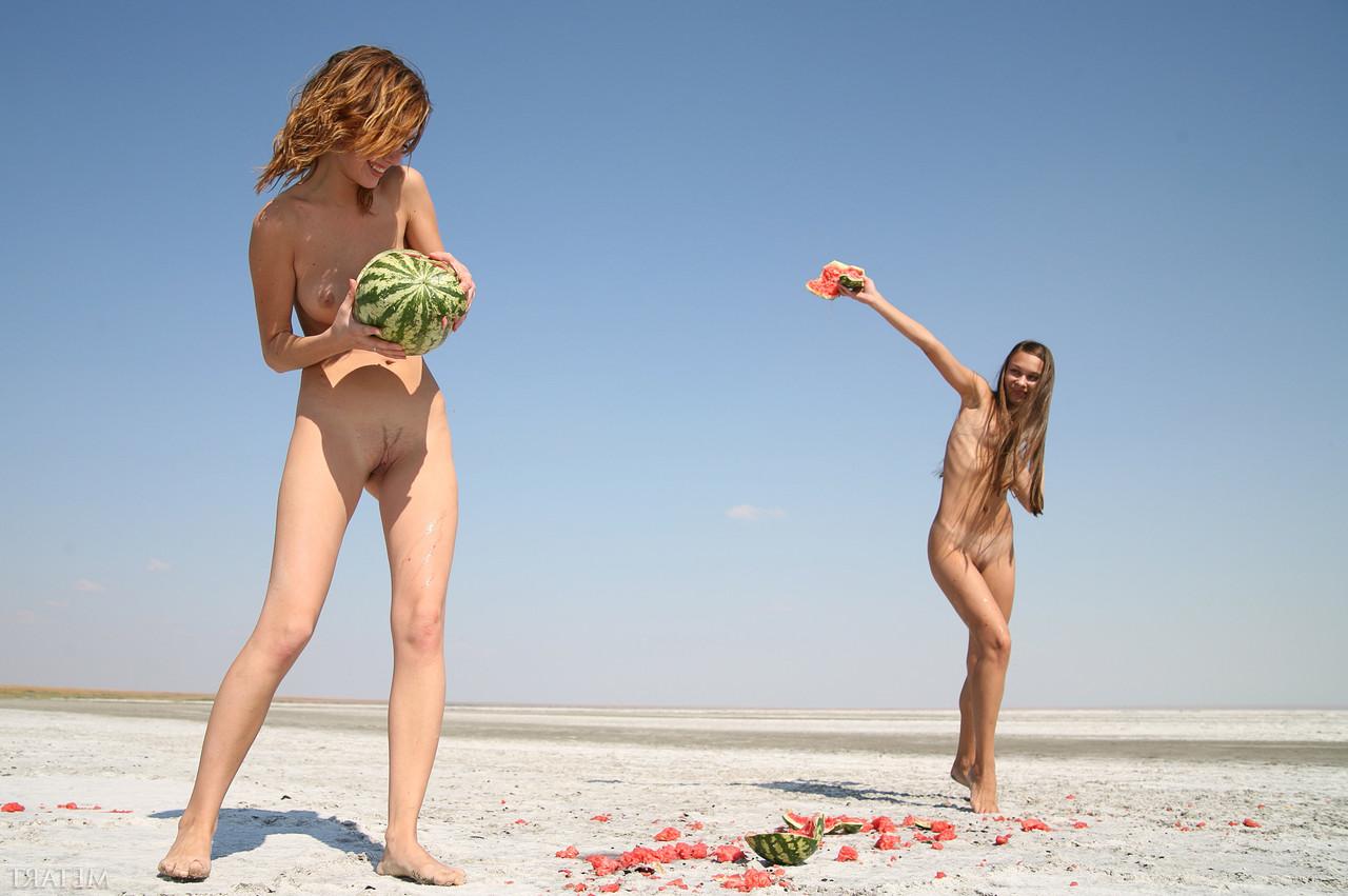20P Teens Freya A & Itna A play with watermelons while posing naked on the beach