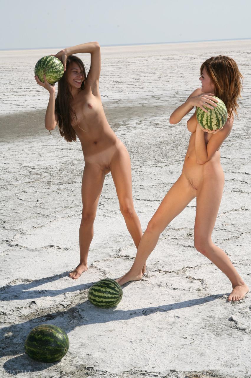 20P Teens Freya A & Itna A play with watermelons while posing naked on the beach