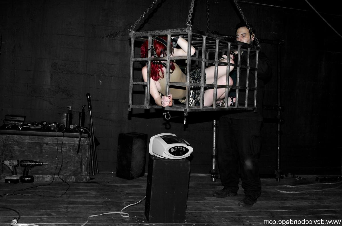17P Redheaded slave Arachnia Webb gets tormented while locked in a cage