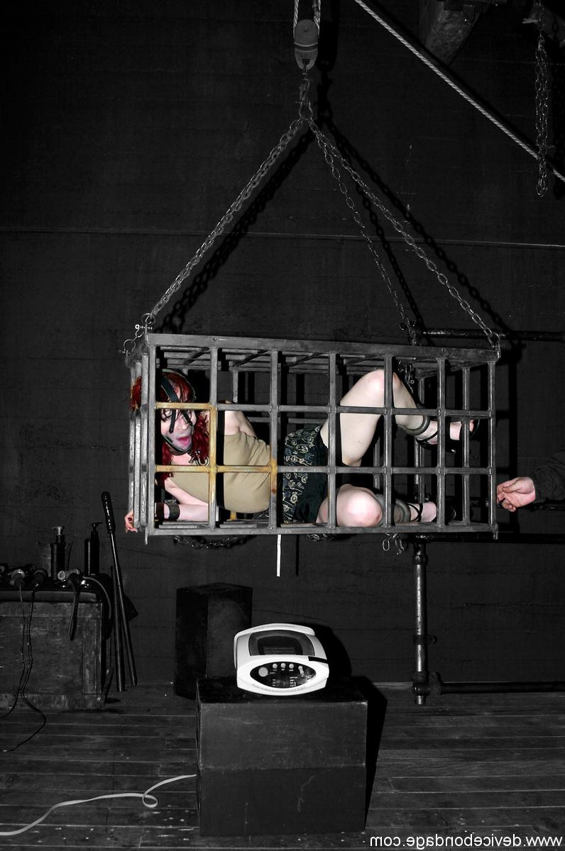 17P Redheaded slave Arachnia Webb gets tormented while locked in a cage