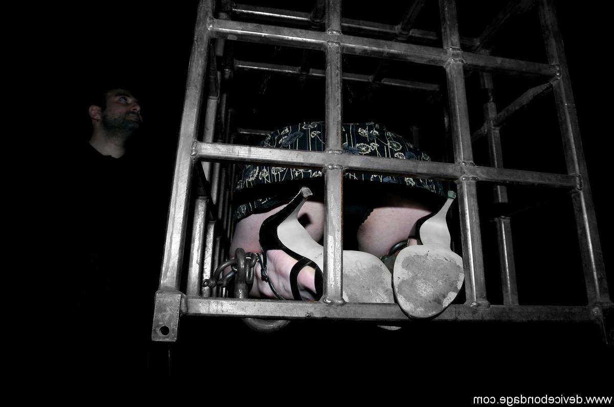 17P Redheaded slave Arachnia Webb gets tormented while locked in a cage