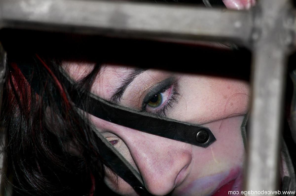 17P Redheaded slave Arachnia Webb gets tormented while locked in a cage