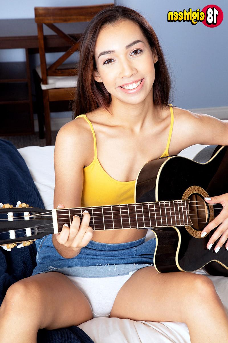 20P Slim teen Jackie Rogen strums a guitar before getting naked for a finger fuck