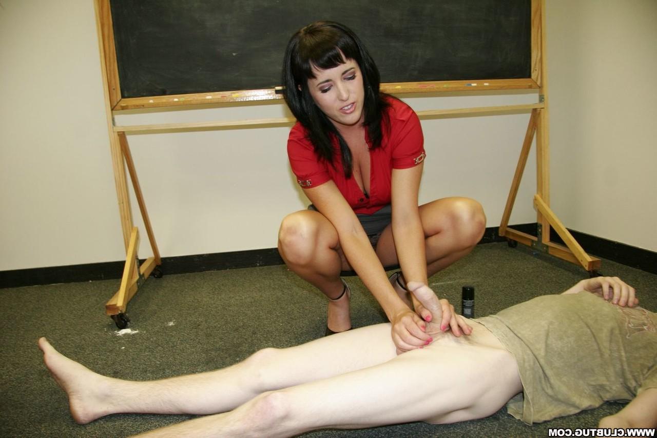 12P Dark haired teacher Dixie Comet tramples a student's dick before a handjob