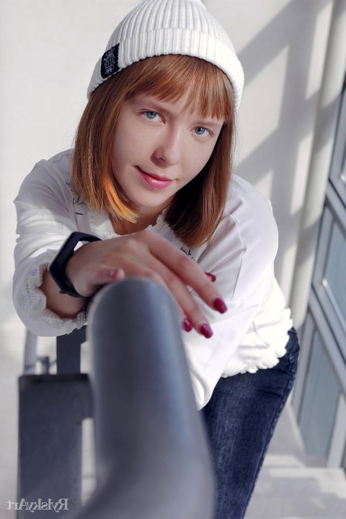 16P Young looking girl Dream sports red lips while getting undressed