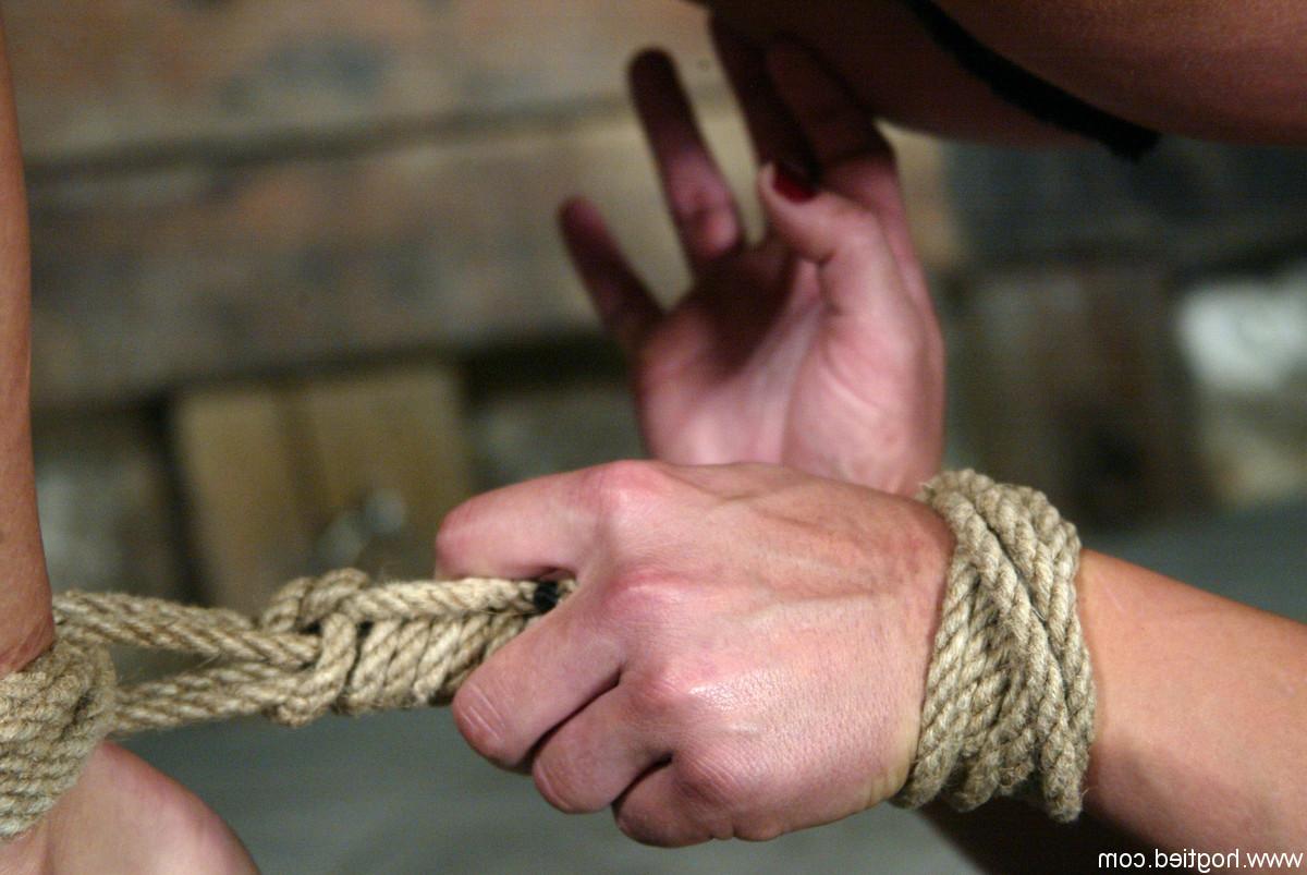 20P Tied up blonde chick Vendetta sucks a dildo while dangling from the ceiling