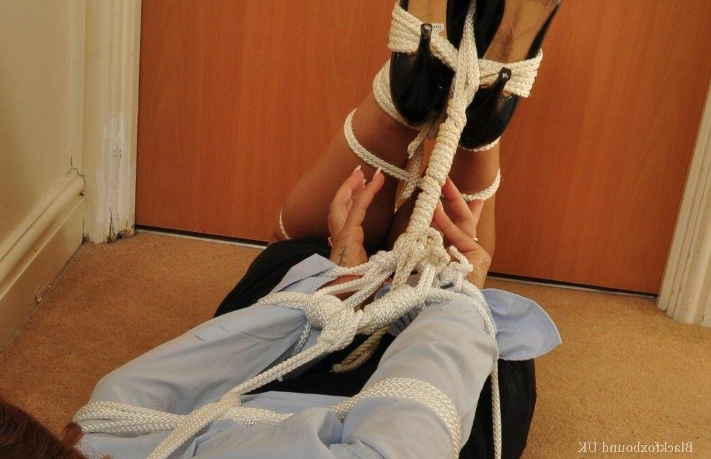16P Redheaded security lady is left alone after being ball gagged and tied up