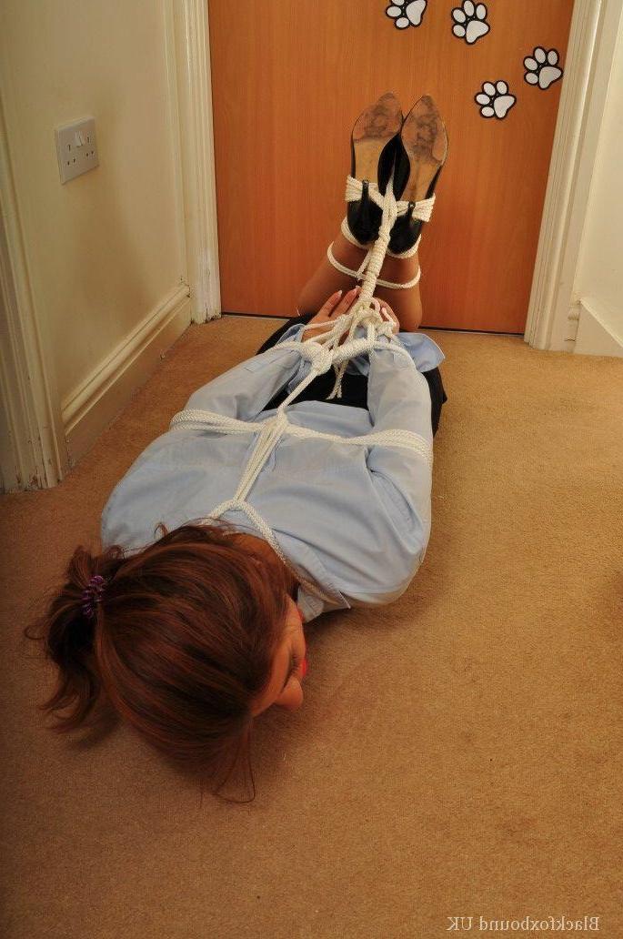 16P Redheaded security lady is left alone after being ball gagged and tied up