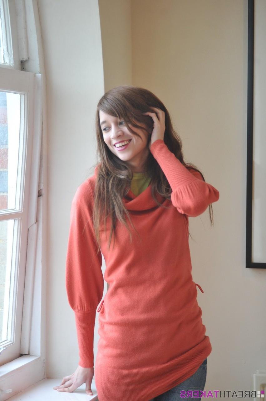 12P Solo model Simone stands naked after removing sweater and jeans
