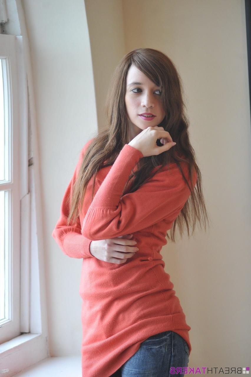 12P Solo model Simone stands naked after removing sweater and jeans