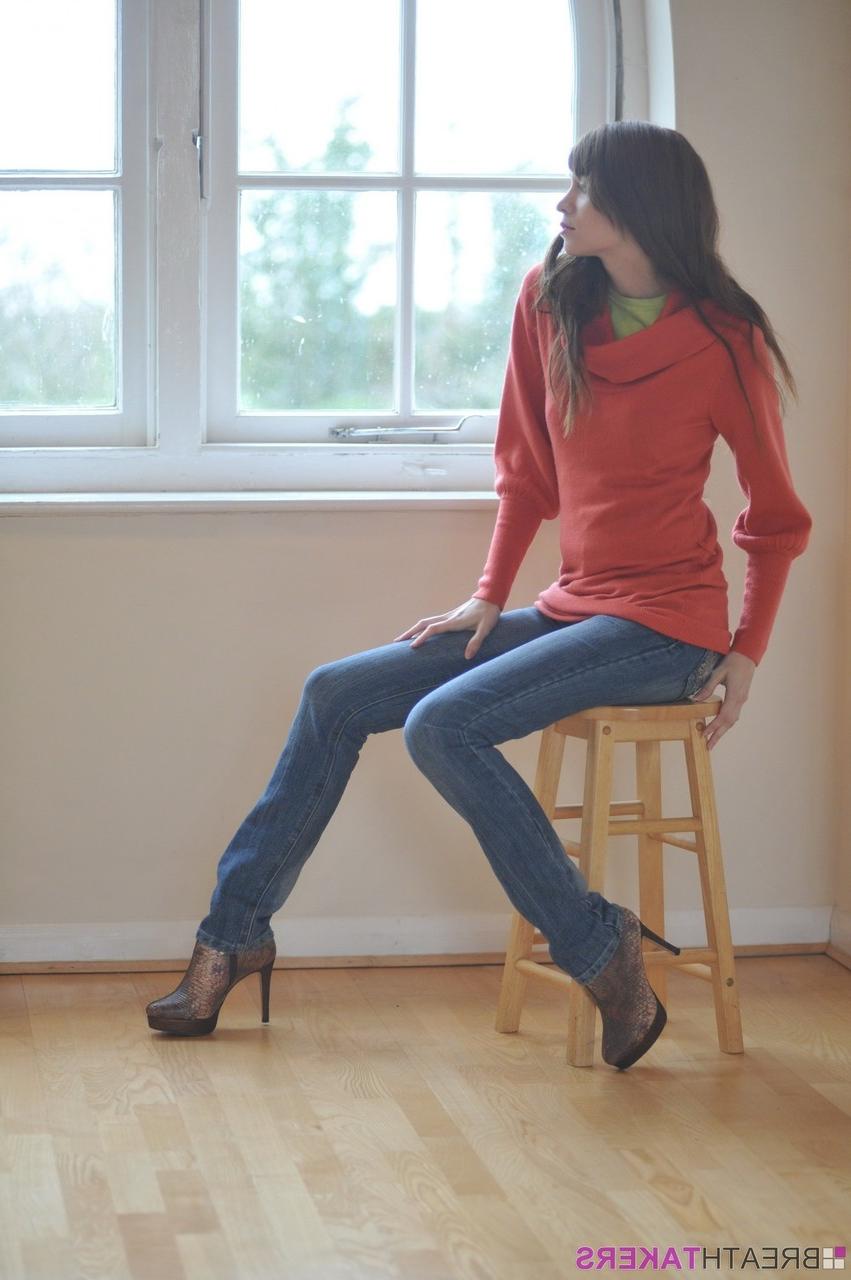 12P Solo model Simone stands naked after removing sweater and jeans