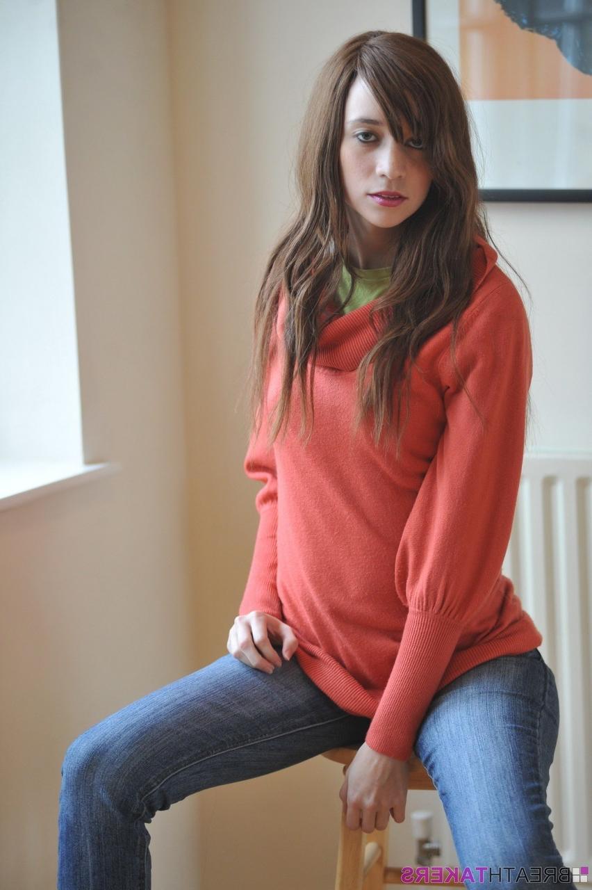 12P Solo model Simone stands naked after removing sweater and jeans