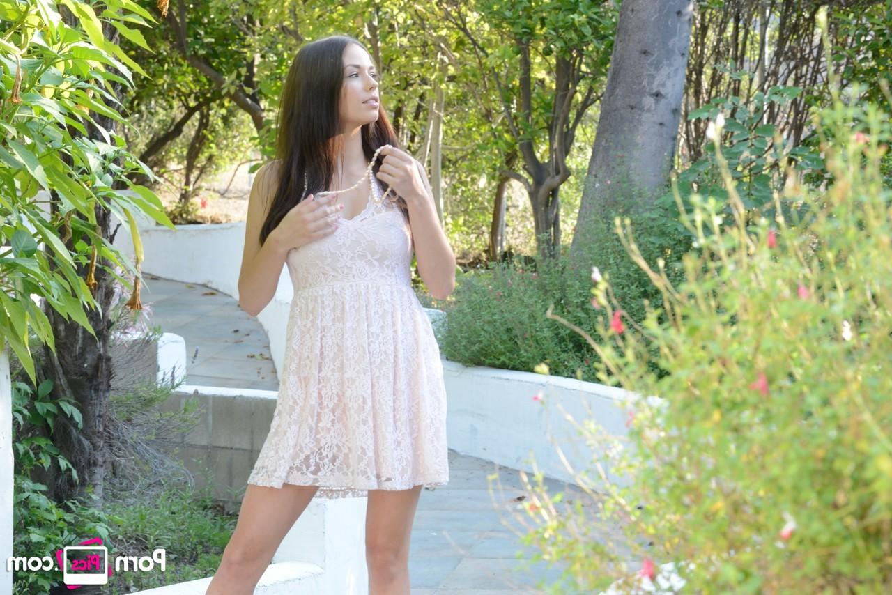 20P Brunette teen Madi Meadows strips in the garden & displays her trimmed cooch