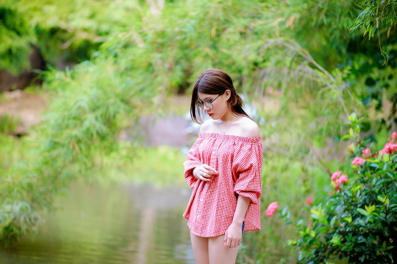 20P Pretty Asian girl with eyeglasses posing in her hot outfit in nature