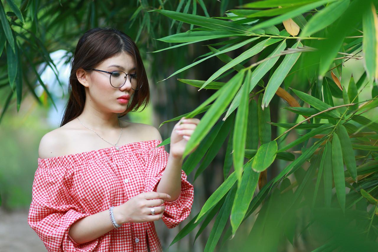 20P Pretty Asian girl with eyeglasses posing in her hot outfit in nature