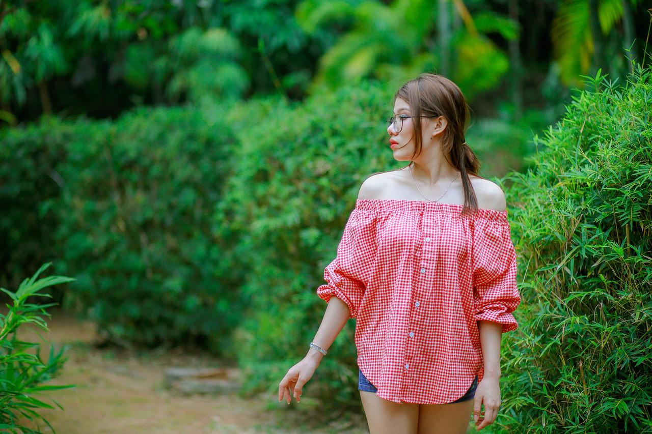 20P Pretty Asian girl with eyeglasses posing in her hot outfit in nature