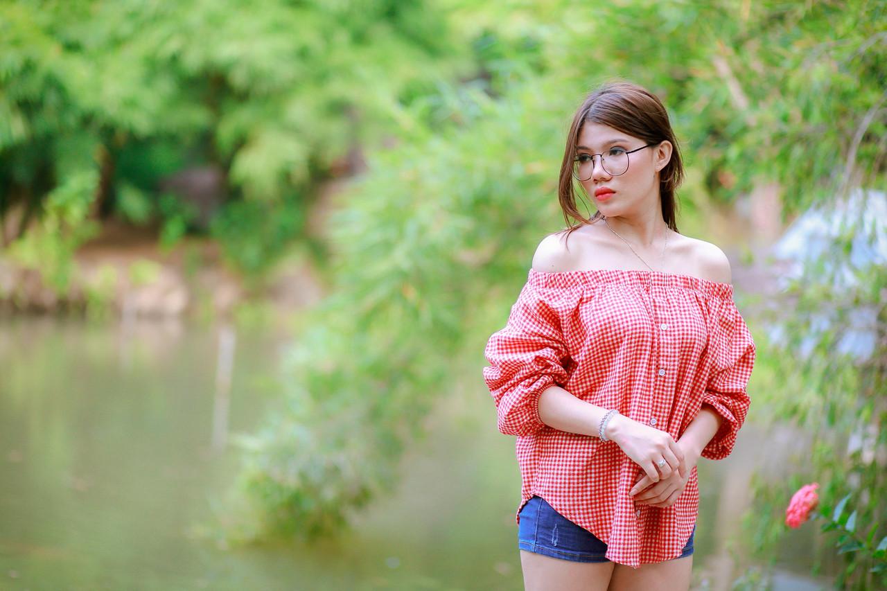 20P Pretty Asian girl with eyeglasses posing in her hot outfit in nature