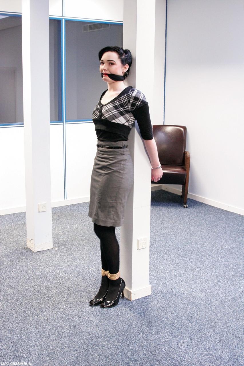 17P Submissive short haired cutie Lilly being tied up at the office
