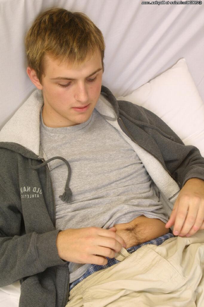 20P Innocent looking Caucasian boy Cody 1 shows off his big dick while jerking off