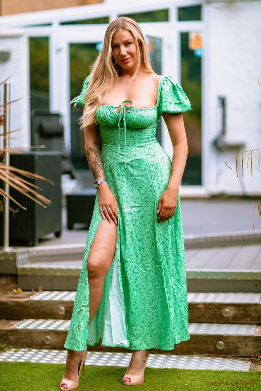 12P Hot UK blonde Danielle Maye unleashes her big tits on a patio in high heels