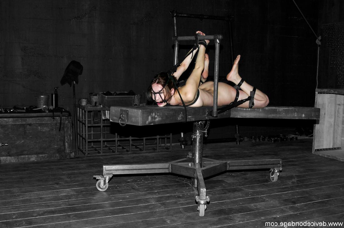 17P Naked female is restrained and hogtied before her handler masturbates her
