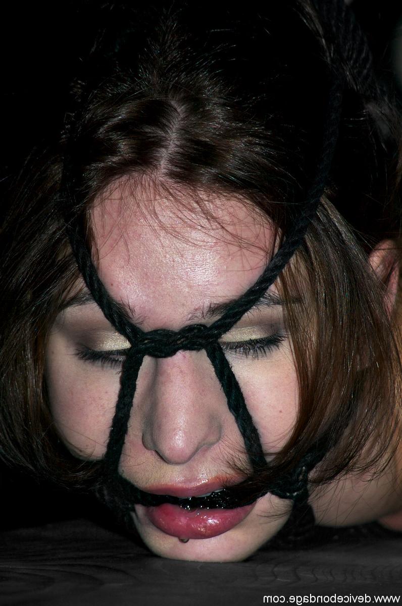 17P Naked female is restrained and hogtied before her handler masturbates her