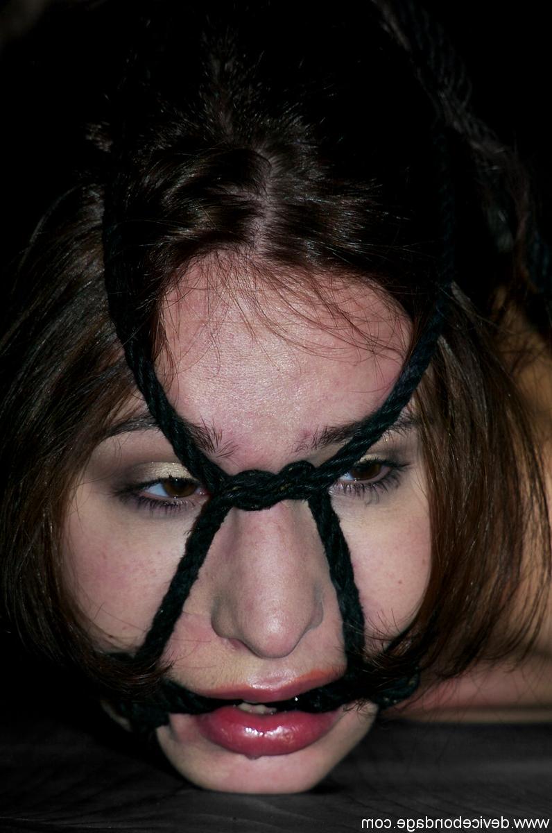 17P Naked female is restrained and hogtied before her handler masturbates her