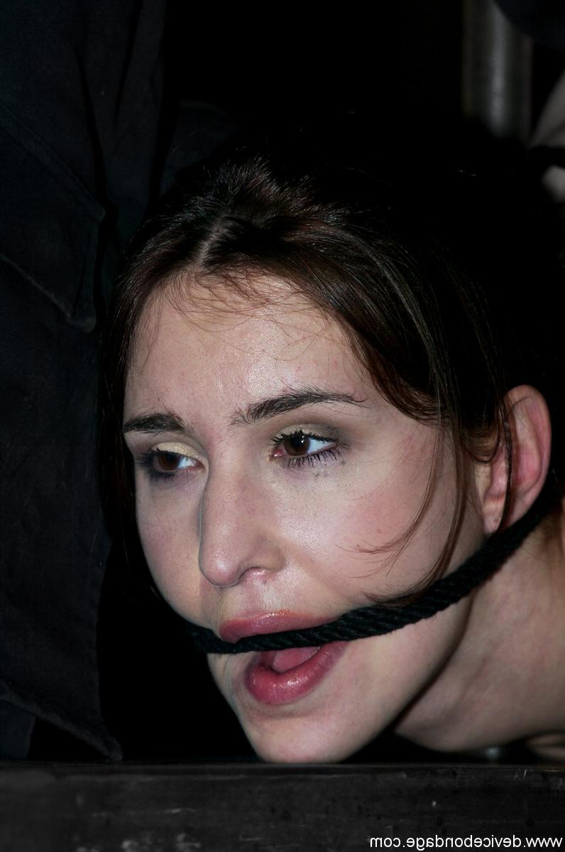 17P Naked female is restrained and hogtied before her handler masturbates her