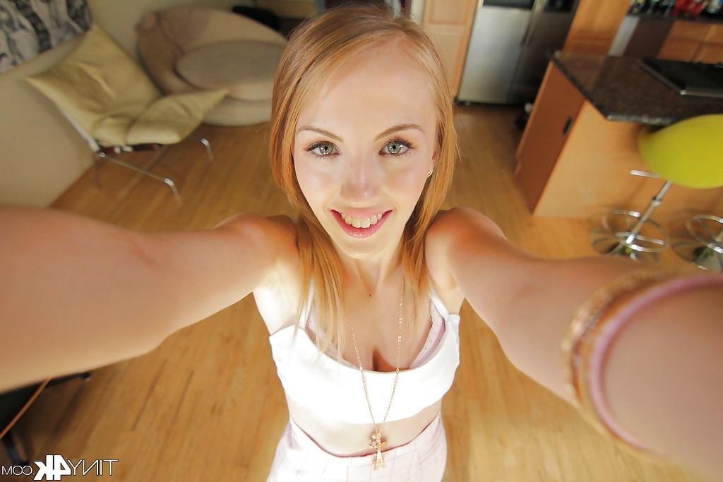 16P Tiny cutie Jenna Marie is spreading her legs and playing with puss