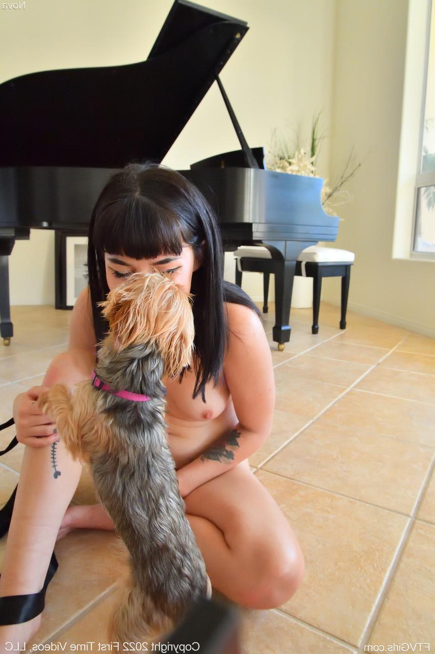 20P Petite dark-haired babe Nova poses naked and toys herself with a glass dildo