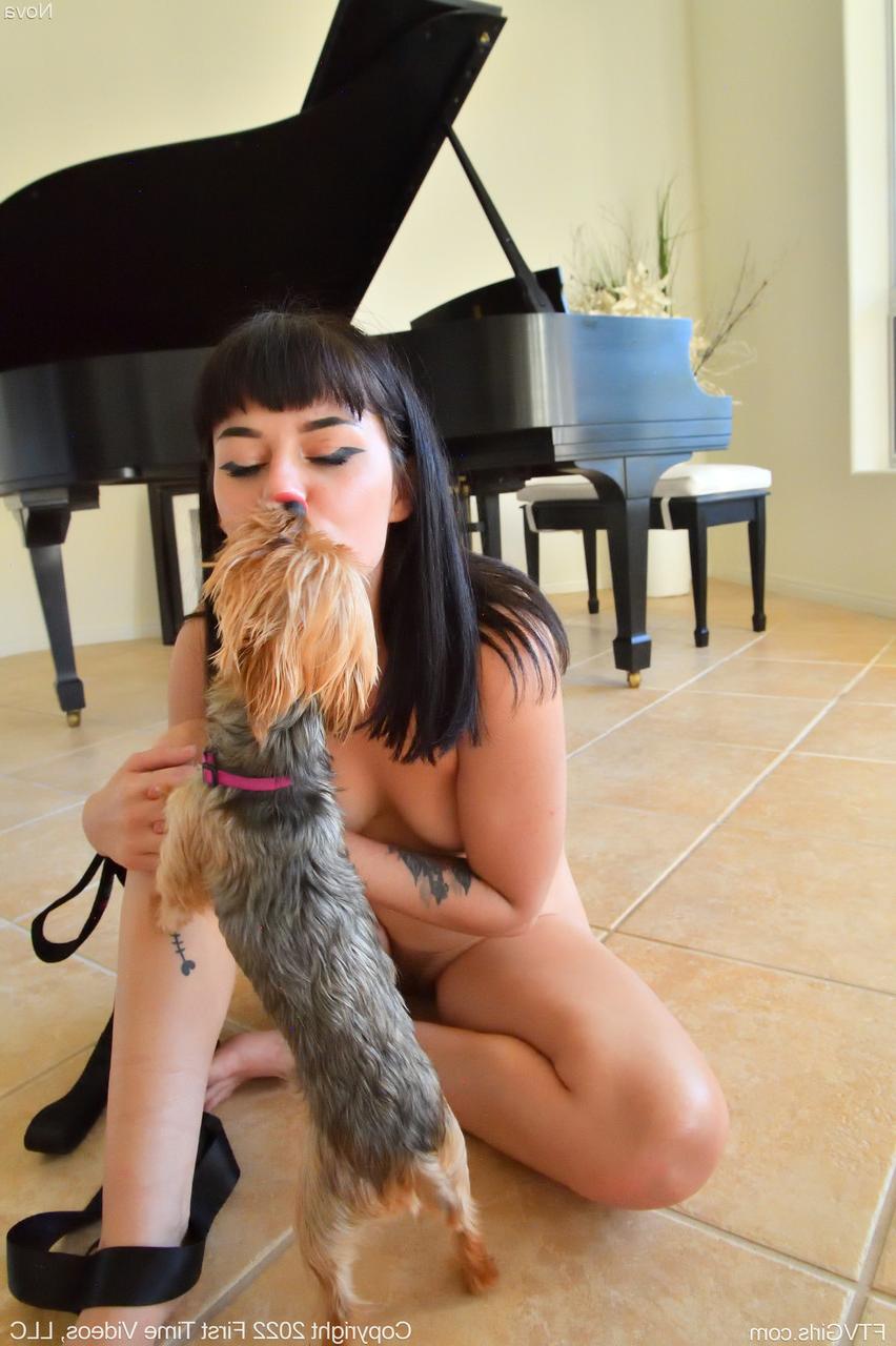 20P Petite dark-haired babe Nova poses naked and toys herself with a glass dildo