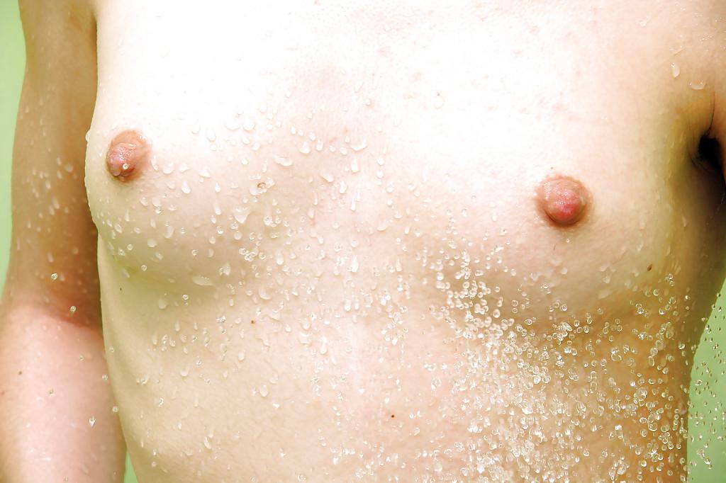 16P Skinny teen girl Rene teasing her shaved slit in the shower
