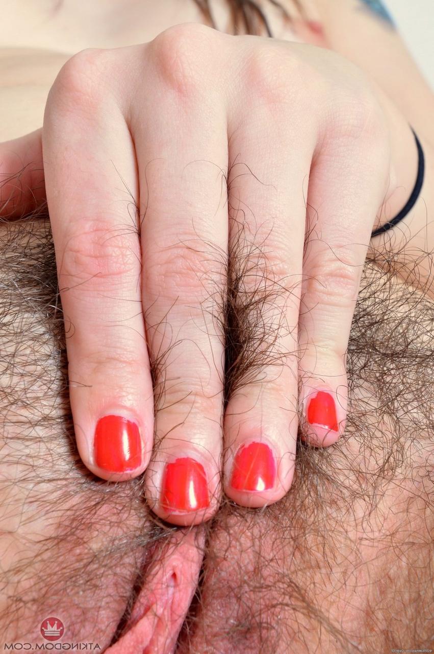 20P American hippie Emmy Lynn sits in the chair and plays with her hairy vagina