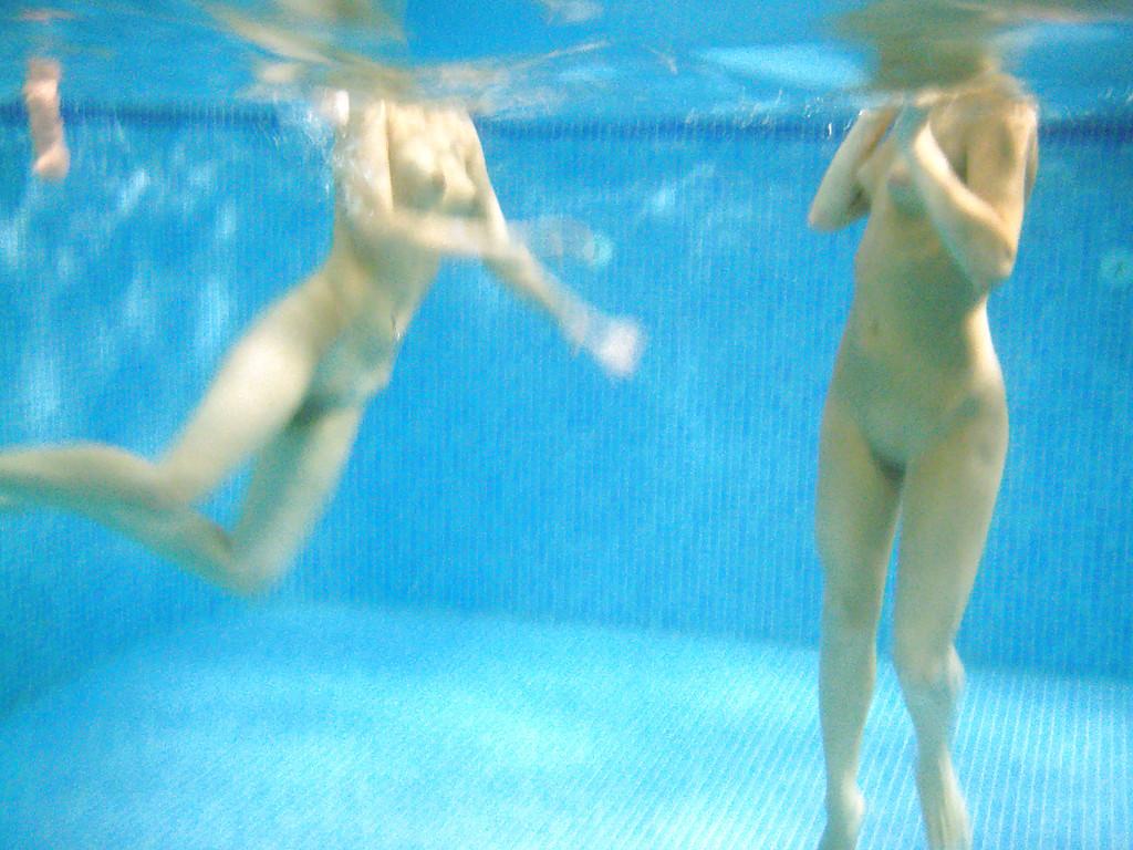 16P Nasty teenage chicks have some fun in the pool using their sex toys