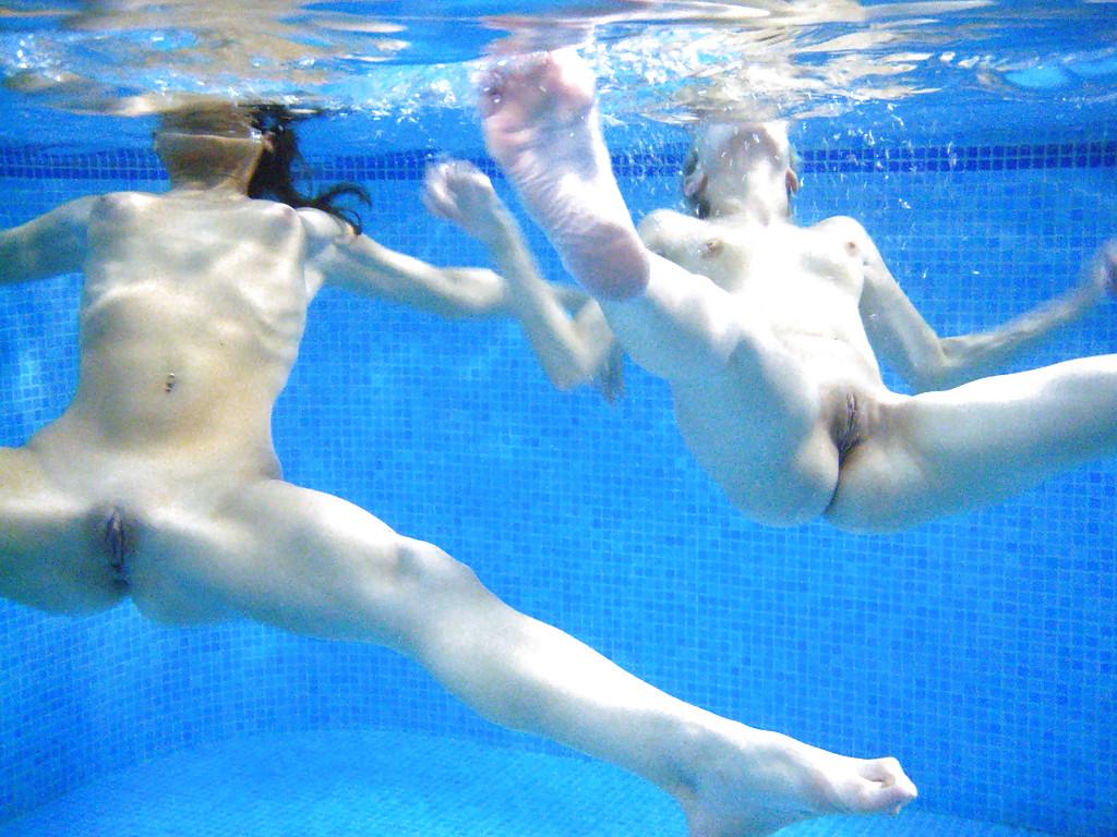 16P Nasty teenage chicks have some fun in the pool using their sex toys