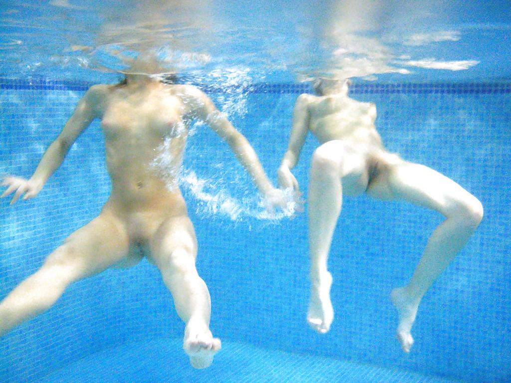 16P Nasty teenage chicks have some fun in the pool using their sex toys