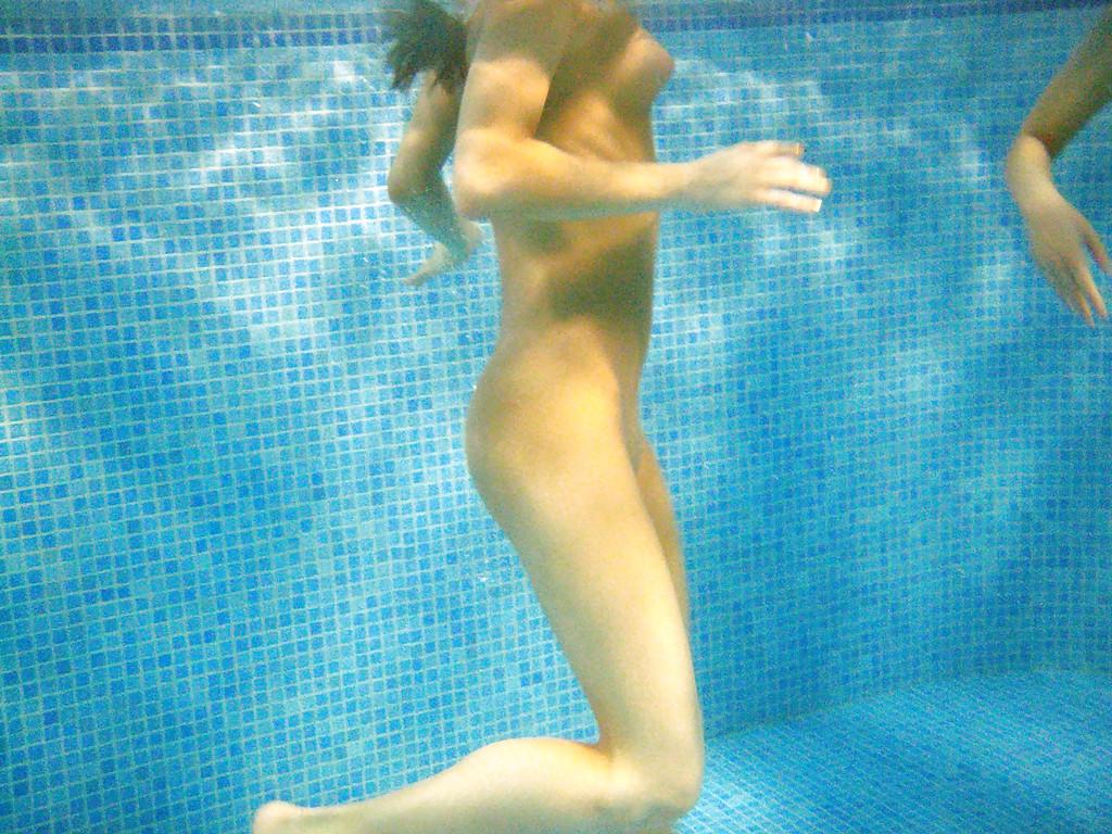 16P Nasty teenage chicks have some fun in the pool using their sex toys