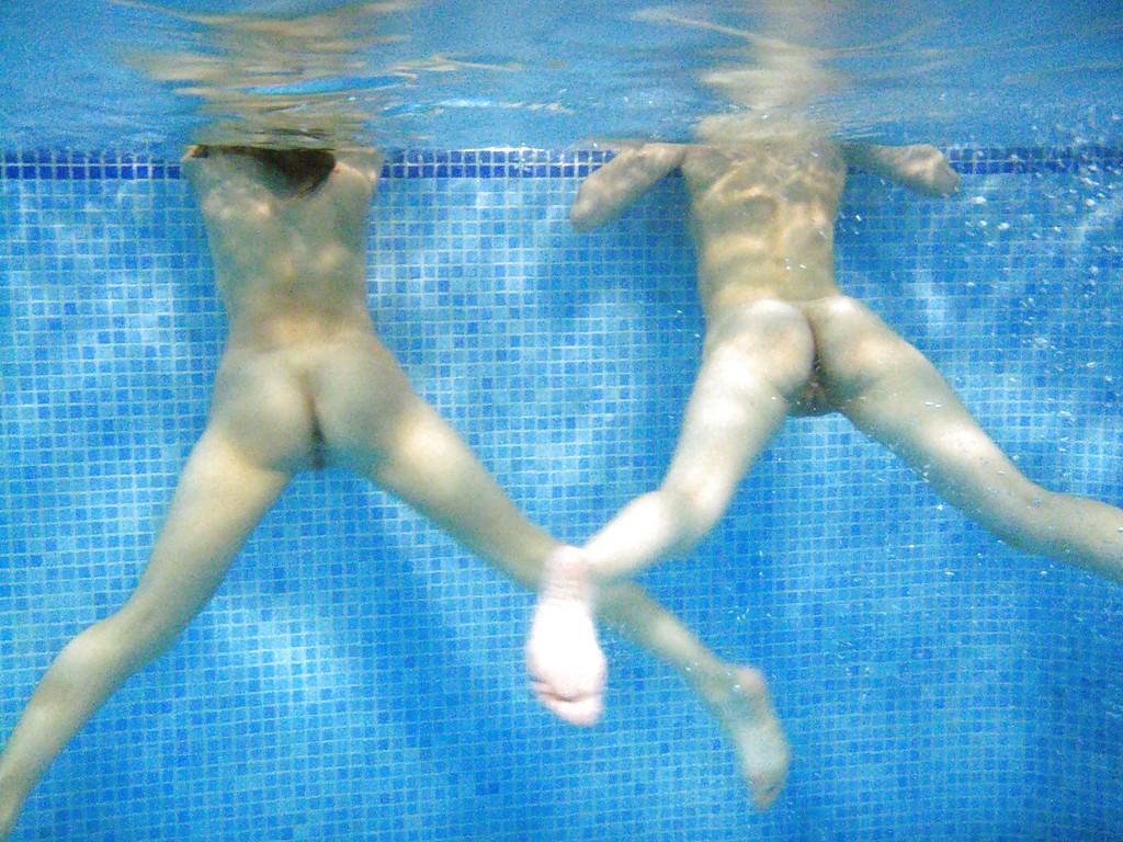 16P Nasty teenage chicks have some fun in the pool using their sex toys