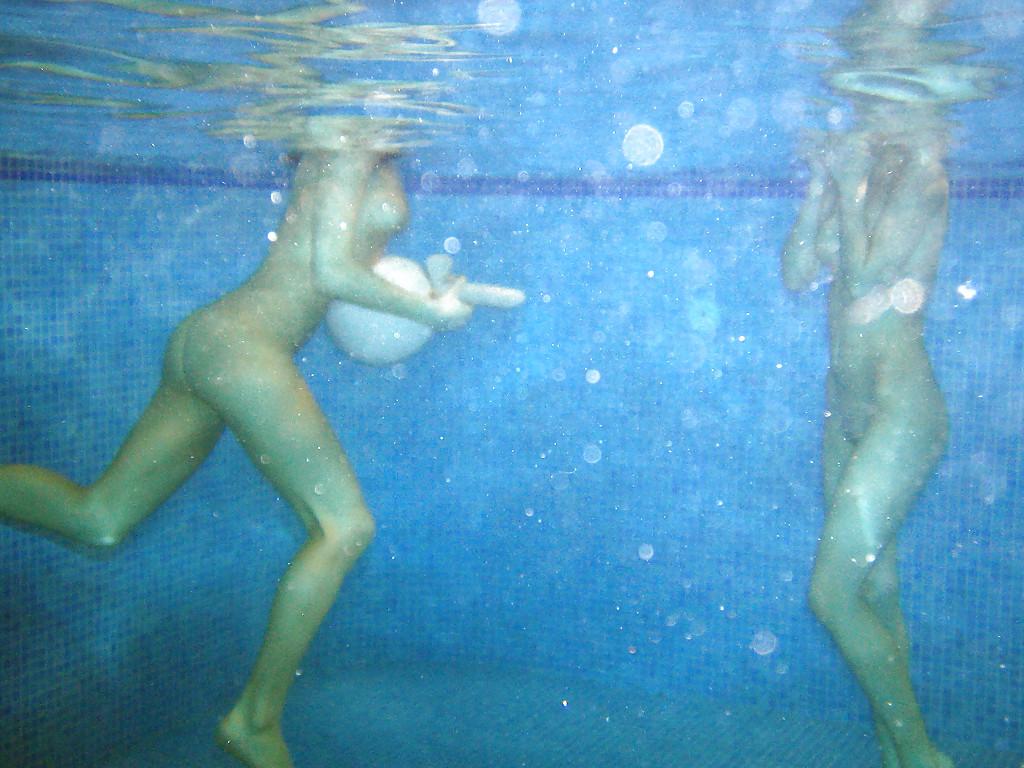 16P Nasty teenage chicks have some fun in the pool using their sex toys