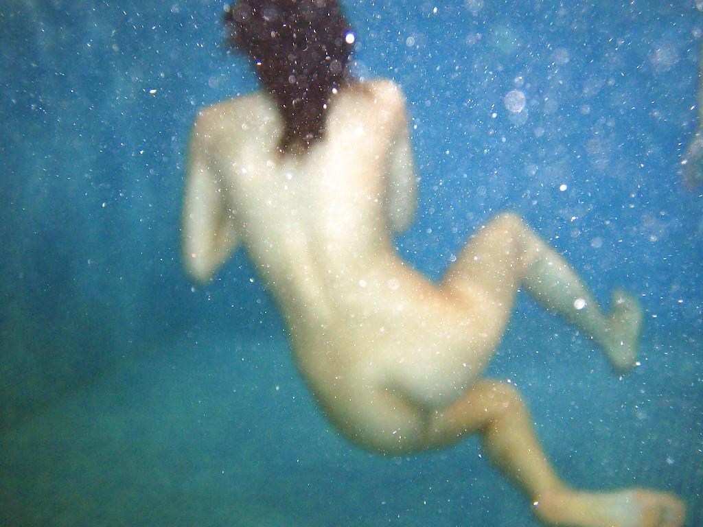 16P Nasty teenage chicks have some fun in the pool using their sex toys