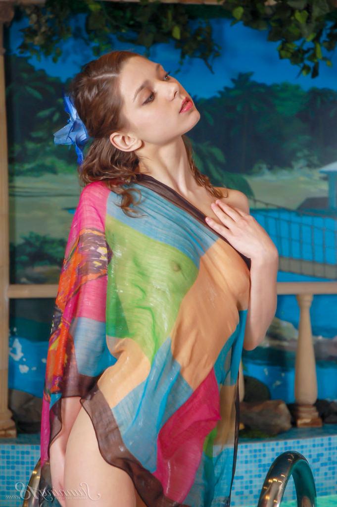 16P 18 year old stunner Iriska takes a skinny dip in an indoor pool