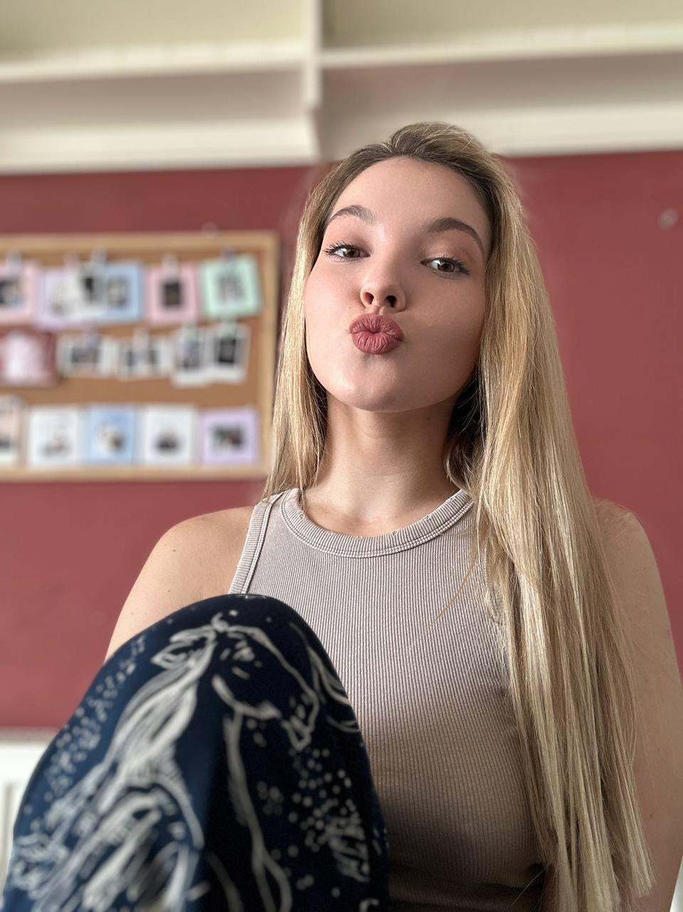 19P Pretty OnlyFans babe All About Diana posing in her hot outfits in a solo