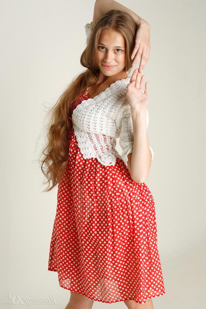 16P Charming 18-year-old Liana B divests herself of clothing in a pair of heels