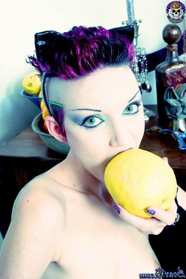 15P Alt girl Scar 13 bites into an in orange and a lemon while totally naked