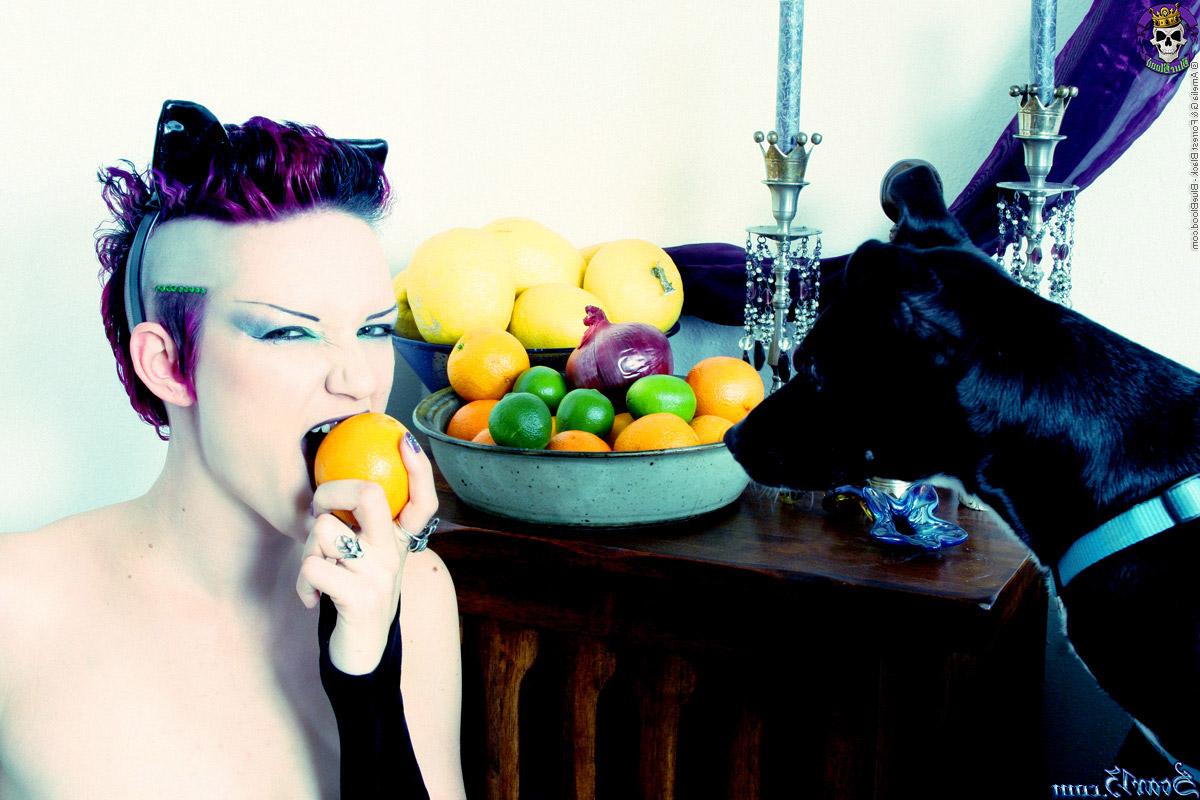 15P Alt girl Scar 13 bites into an in orange and a lemon while totally naked