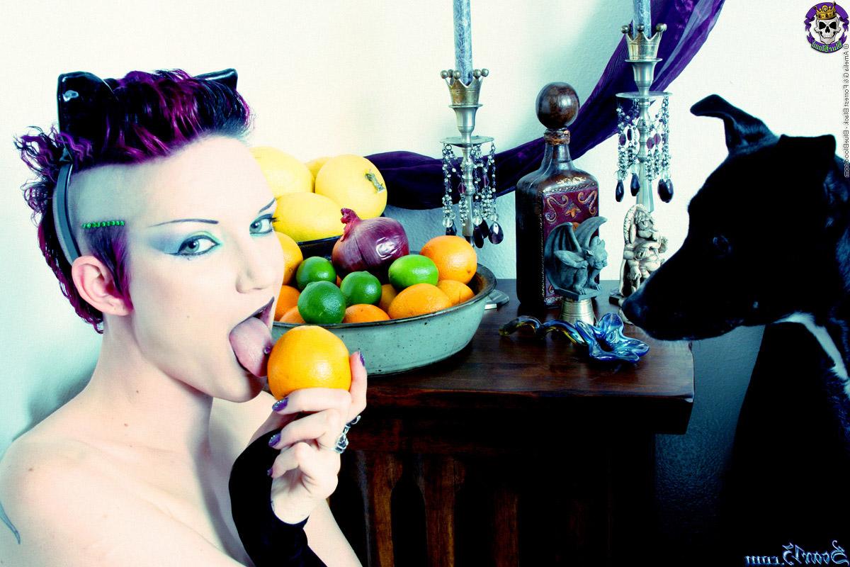 15P Alt girl Scar 13 bites into an in orange and a lemon while totally naked
