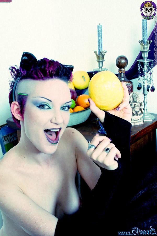 15P Alt girl Scar 13 bites into an in orange and a lemon while totally naked