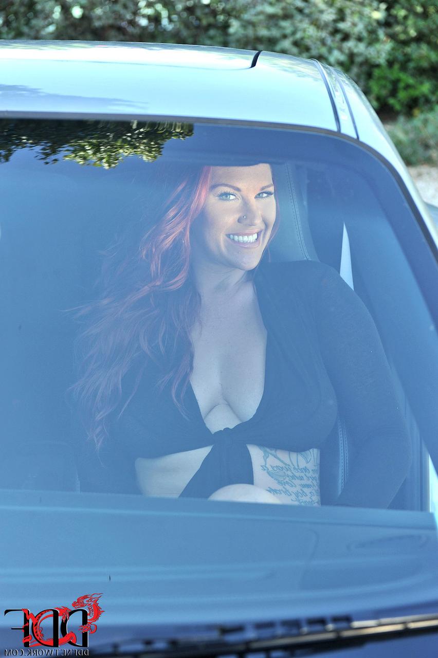 20P Tall redheaded MILF Paige Delight goes topless & flaunts her big tits outdoors