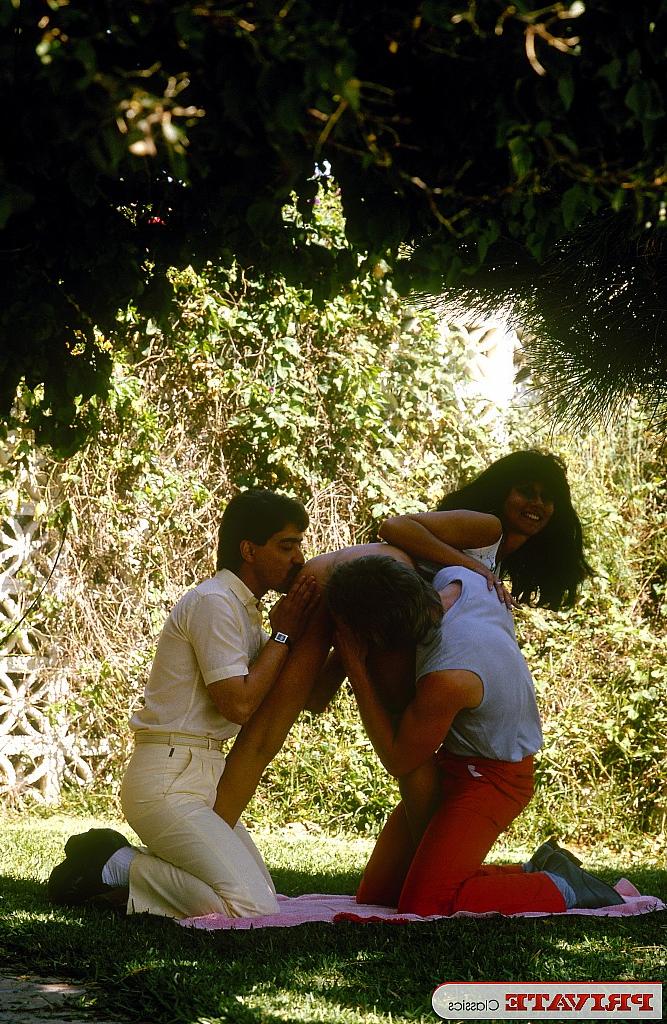 11P Brunette female gets banged by two guys at once among ruins of stone building